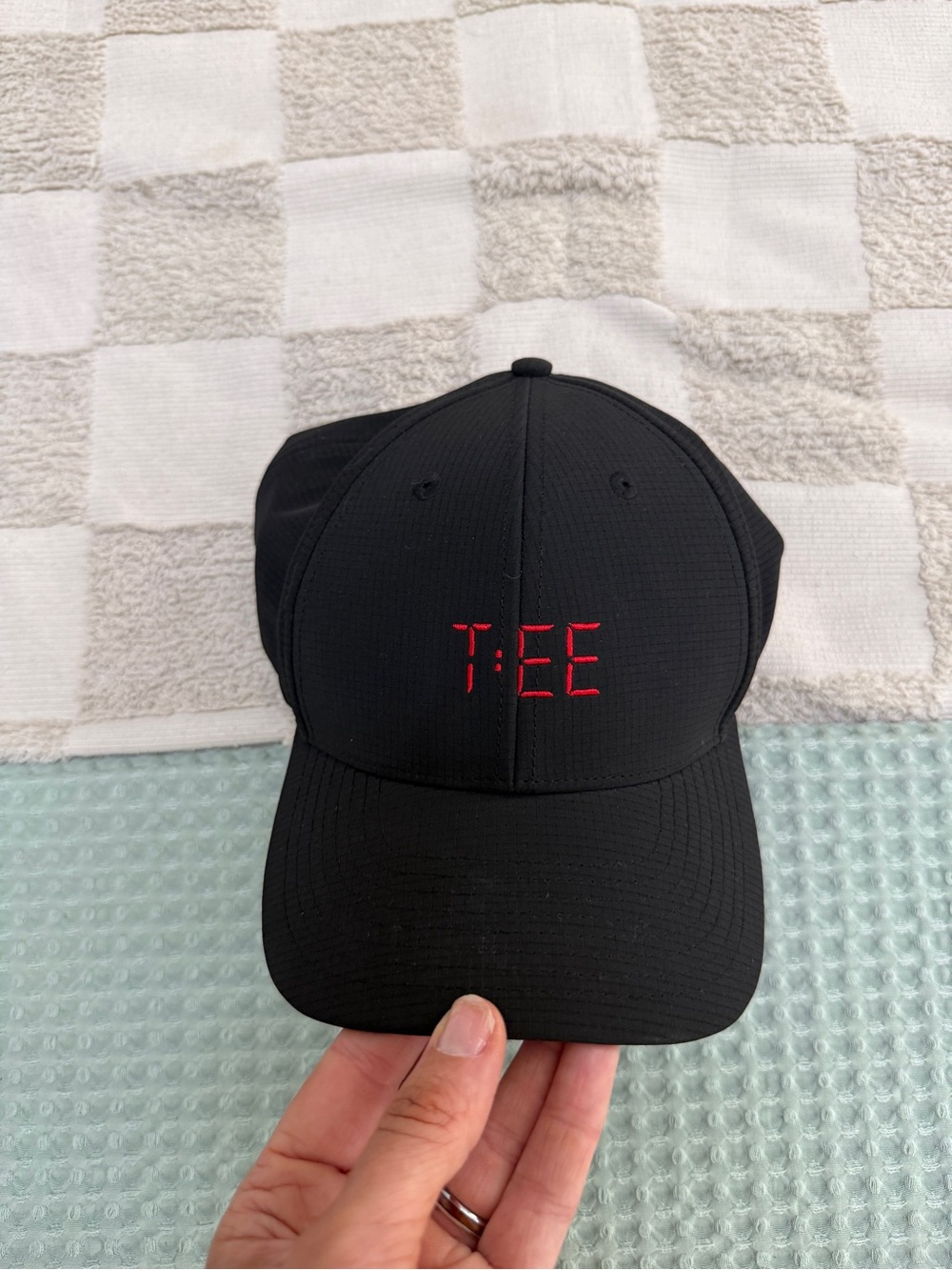 New Waggle Golf hat features "T:EE" embroidered